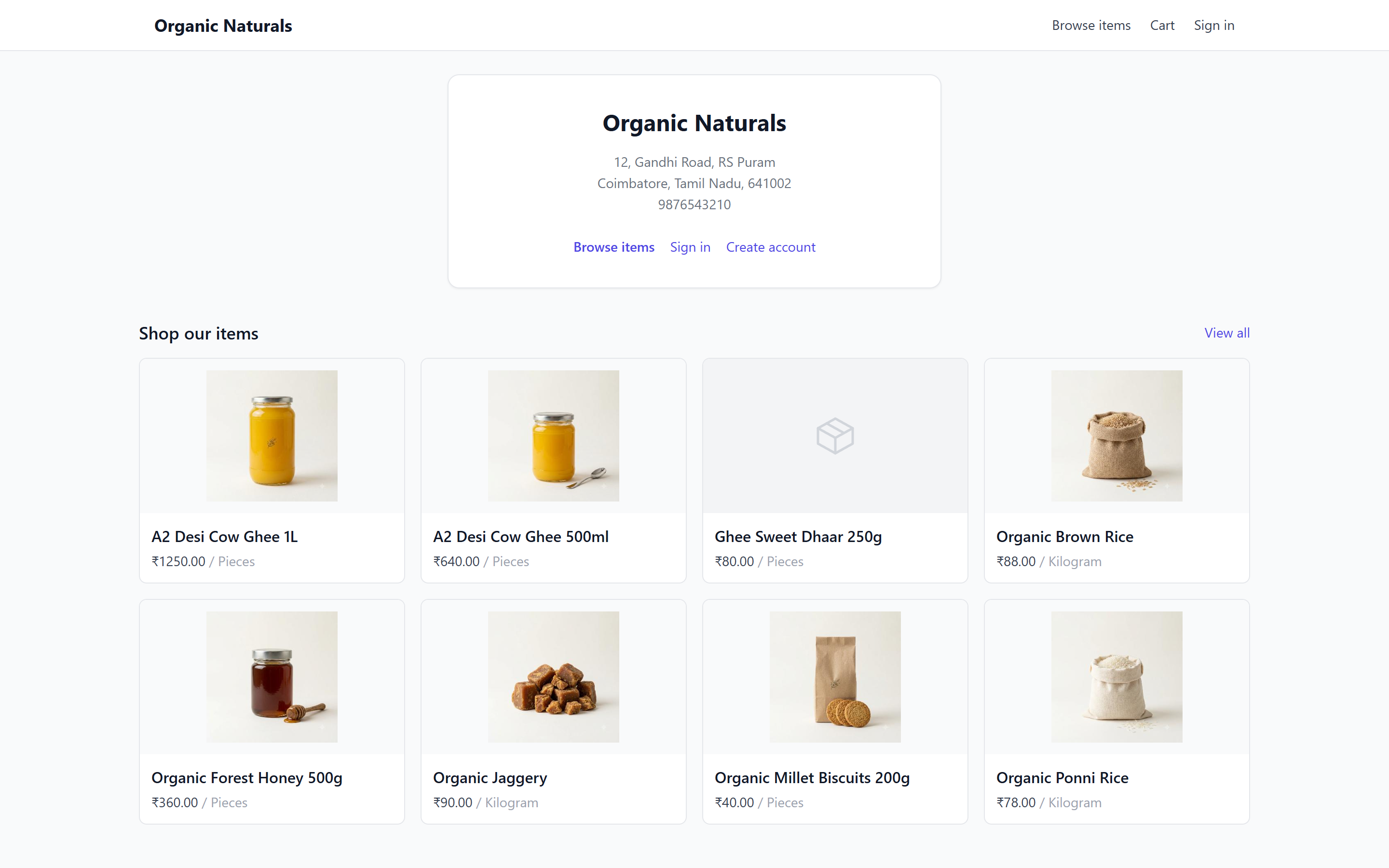 A ShopPos online store home page showing the shop name, address and a grid of items with prices